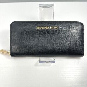 Michael Kors black pebbled leather zip-around long wallet